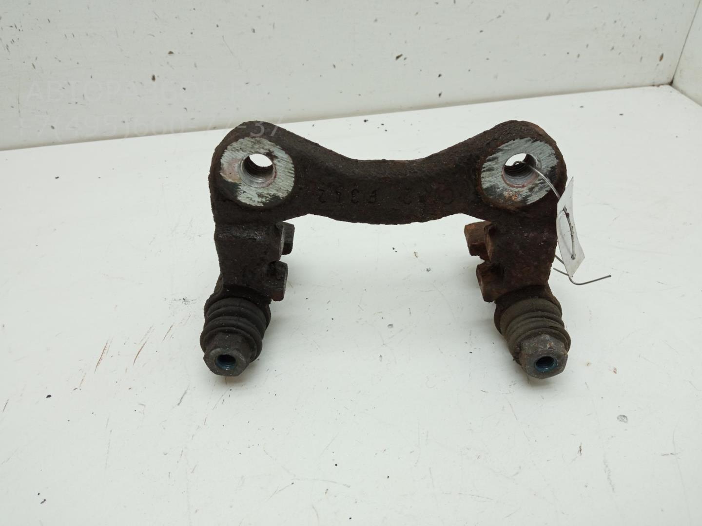 Скоба суппорта заднего