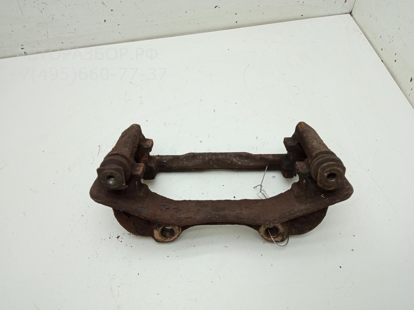 Скоба суппорта переднего