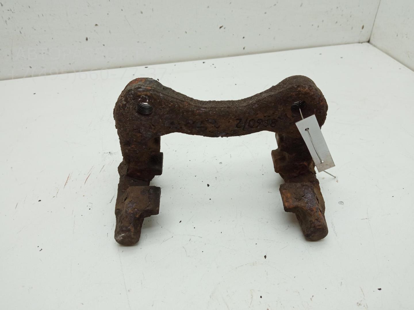 Скоба суппорта заднего