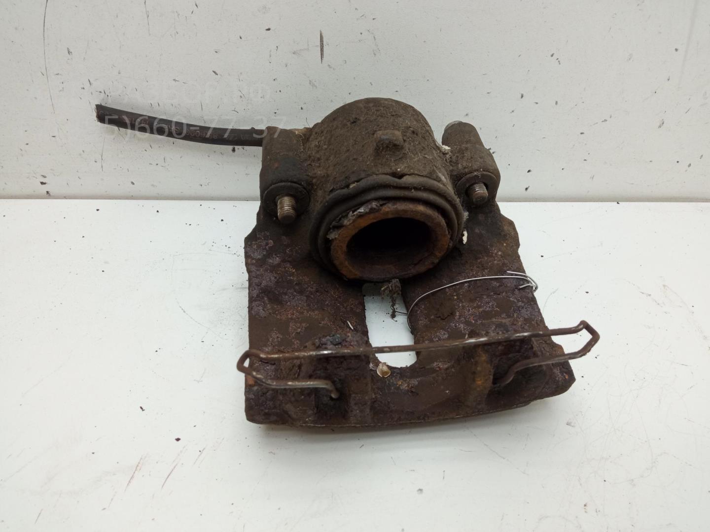 Суппорт передний левый