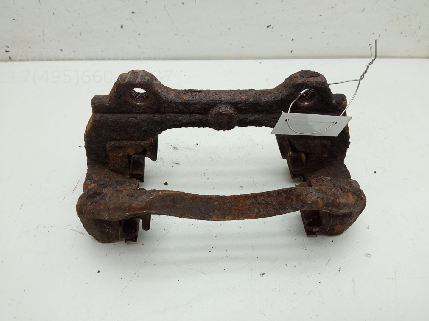 Скоба суппорта переднего