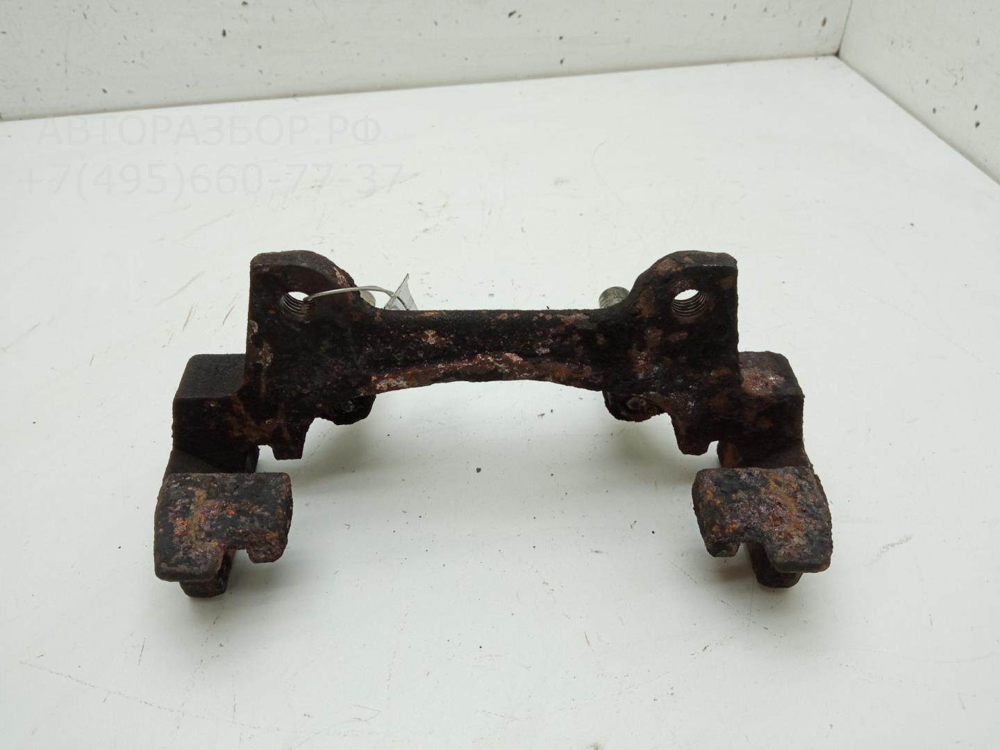 Скоба суппорта переднего