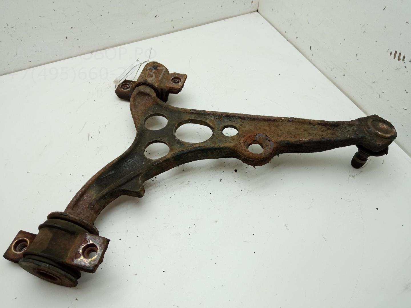 Рычаг передний левый