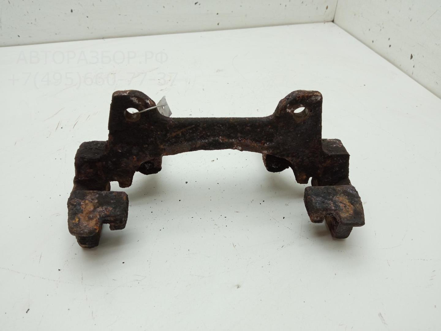 Скоба суппорта переднего