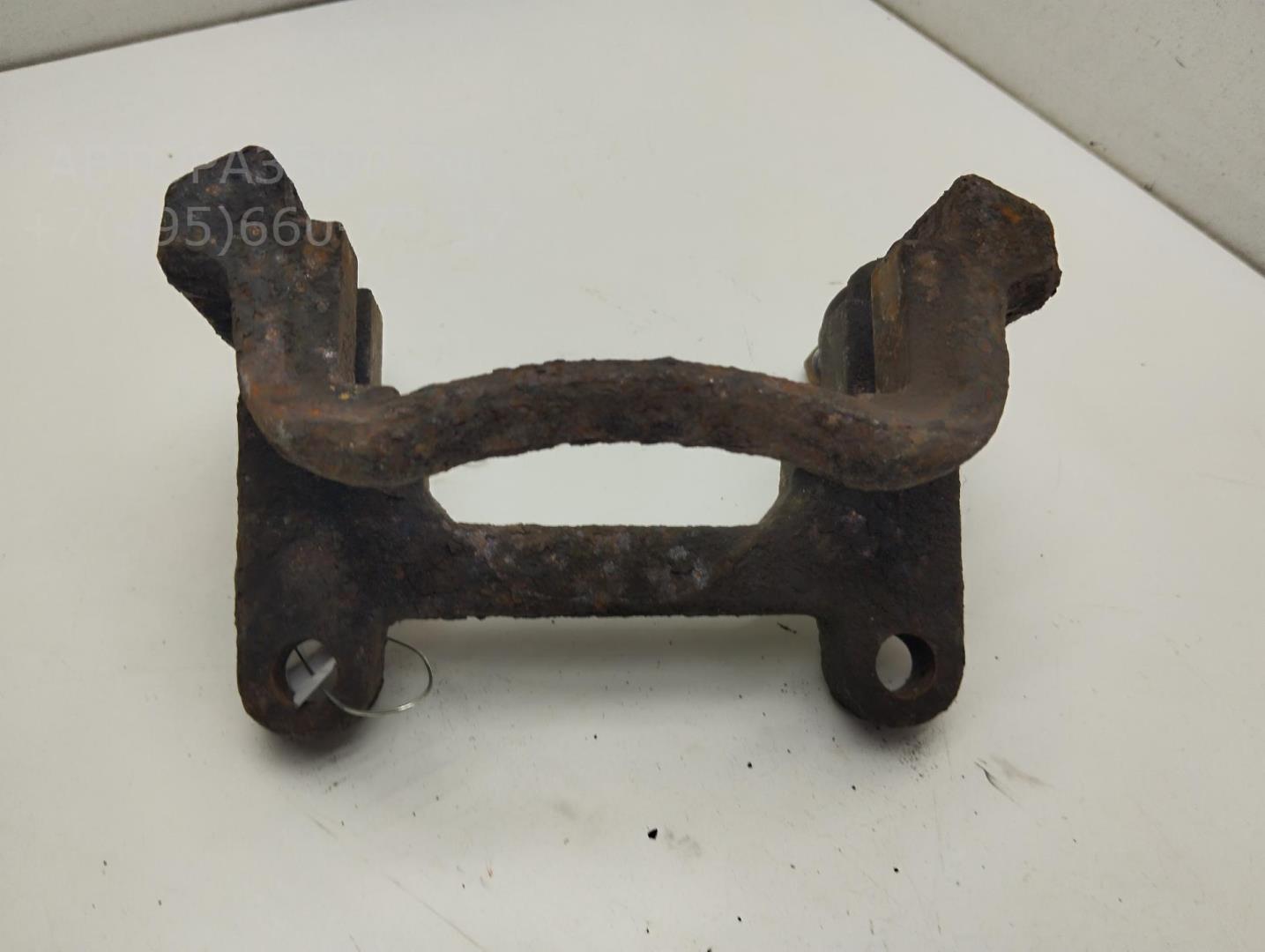 Скоба суппорта заднего