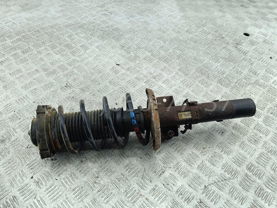 Амортизатор передний левый