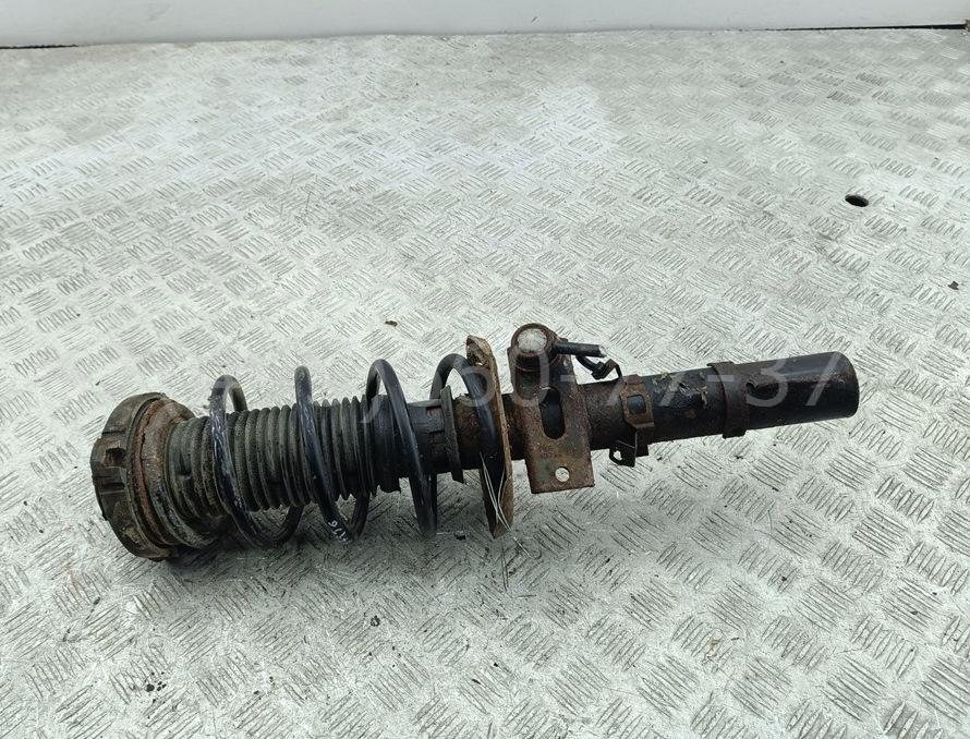 Амортизатор передний левый