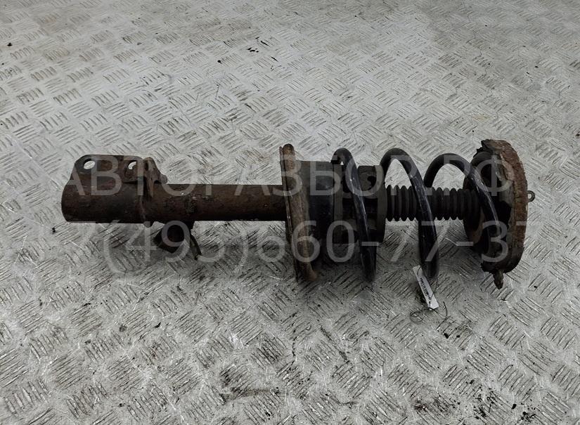 Амортизатор передний левый