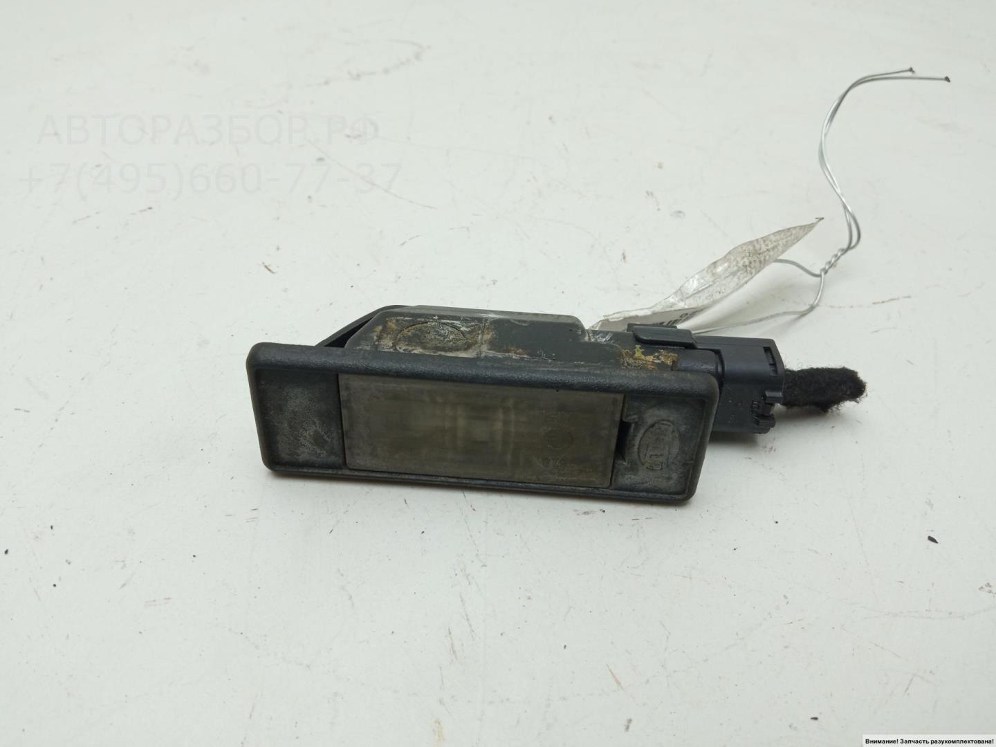 Фонарь подсветки номера