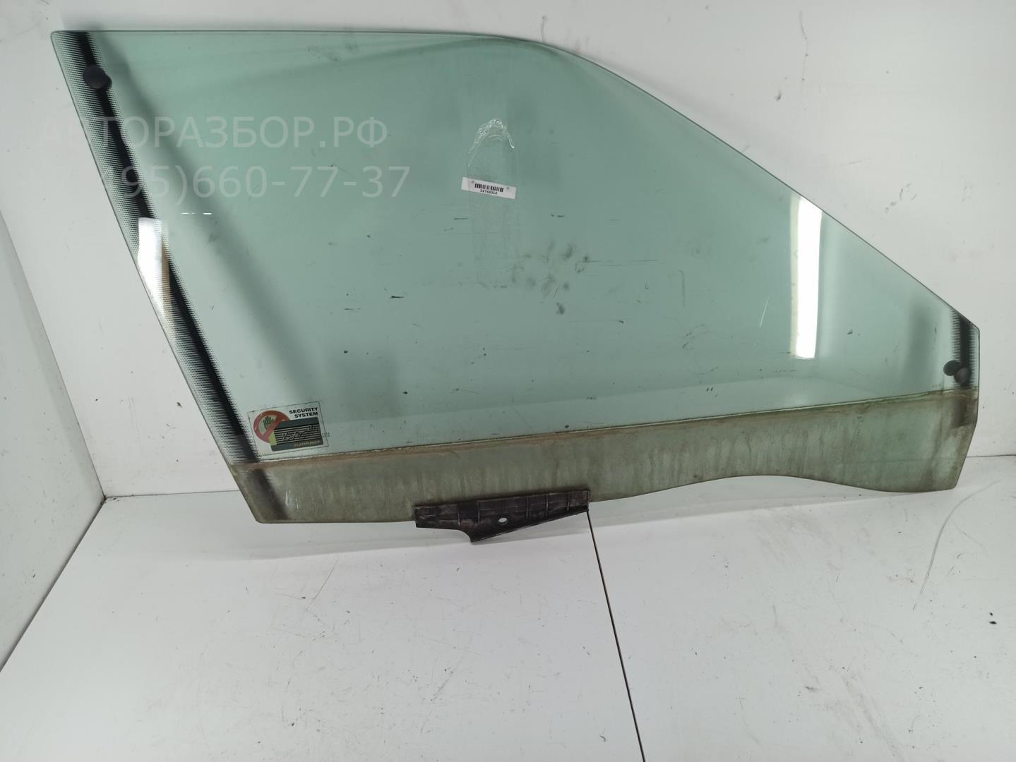 Стекло двери передней правой