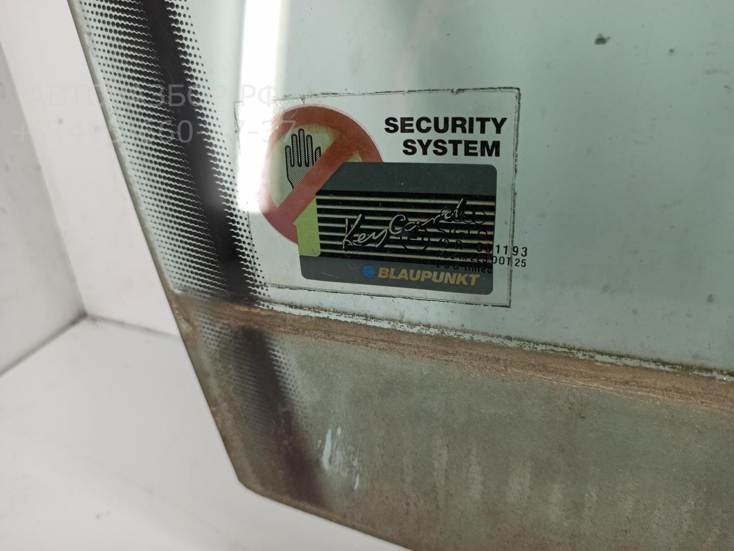 Стекло двери передней правой