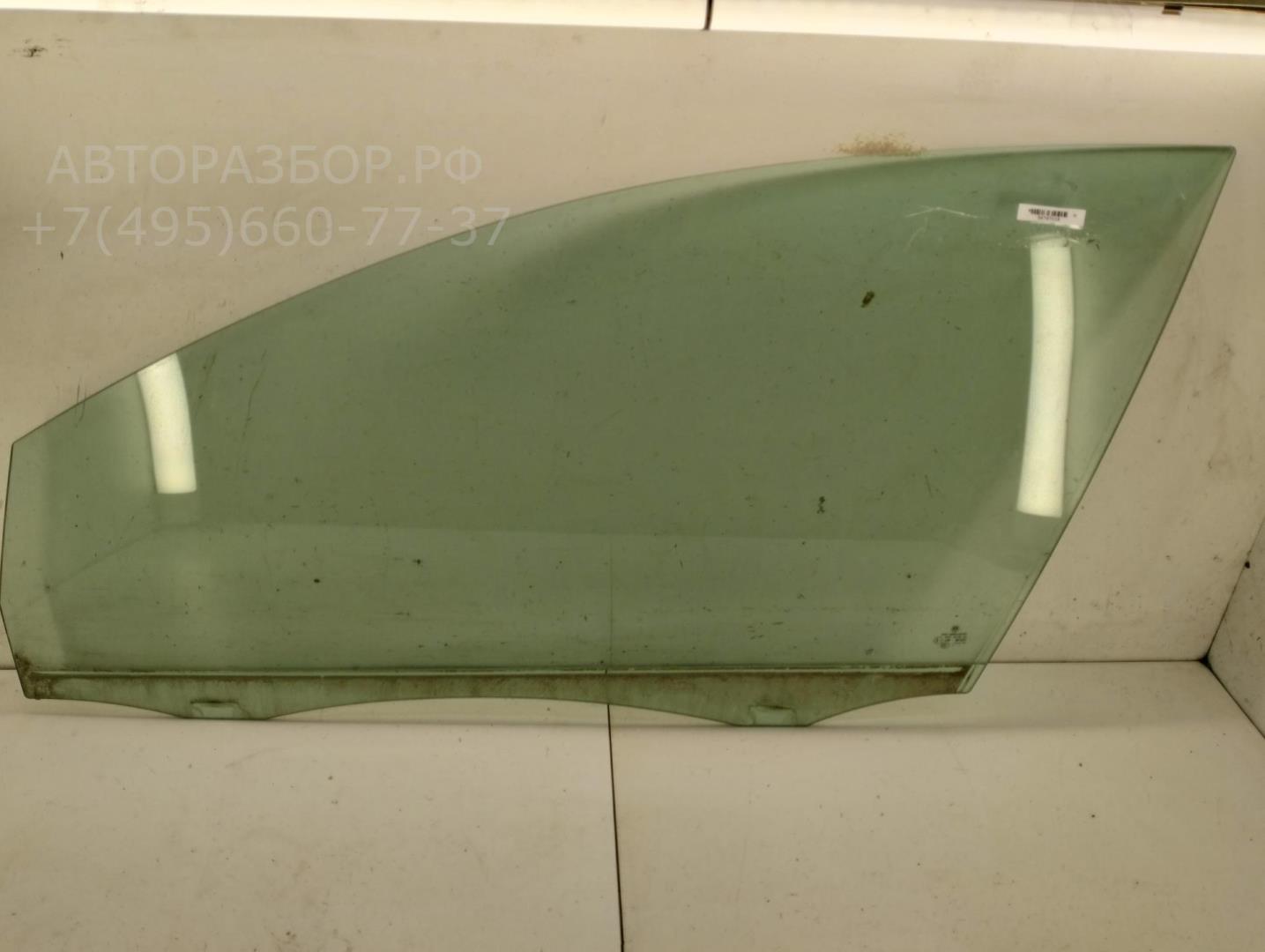 Стекло двери передней левой