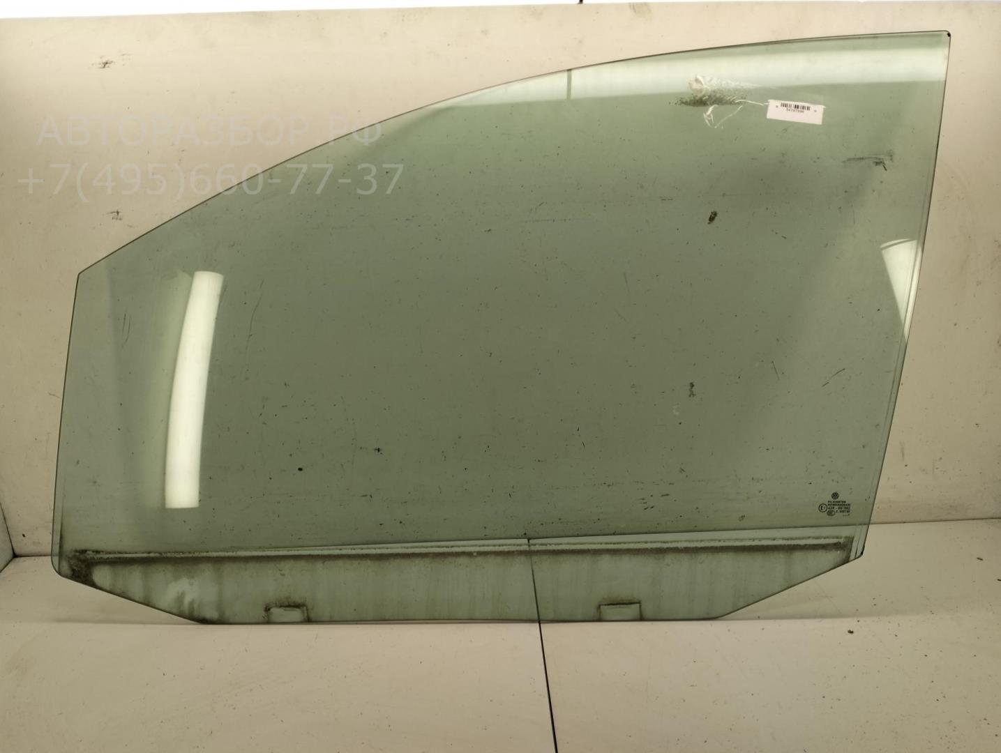 Стекло двери передней левой