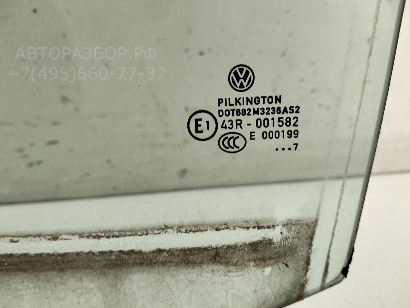 Стекло двери передней левой