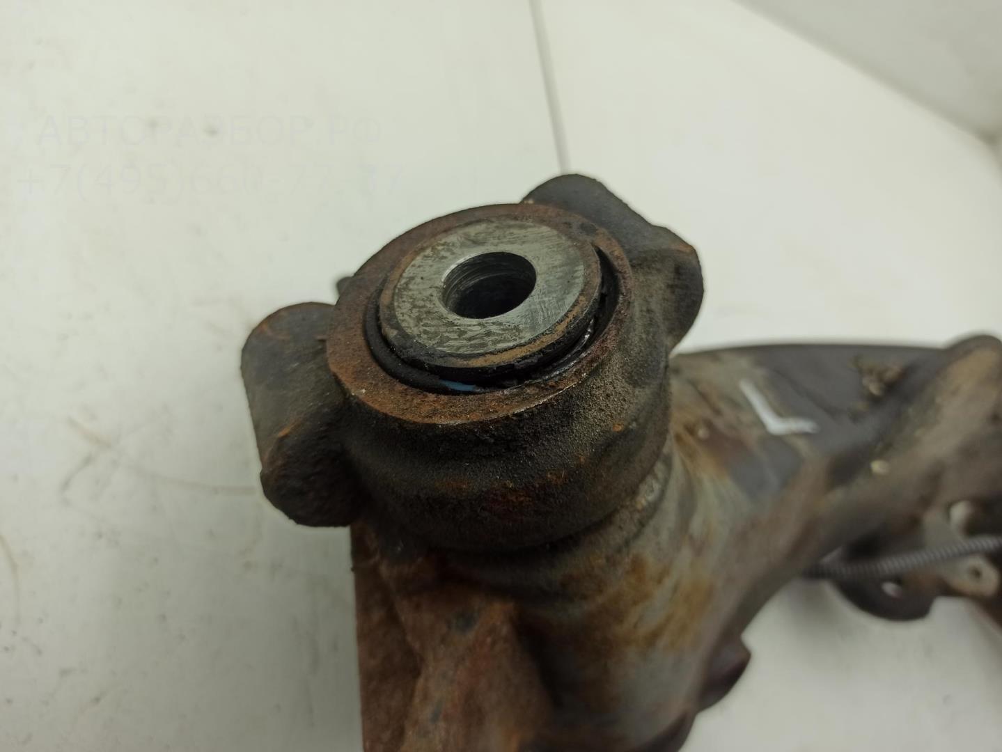 Рычаг задний левый