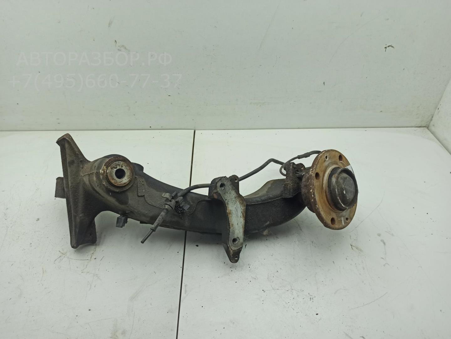 Рычаг задний левый
