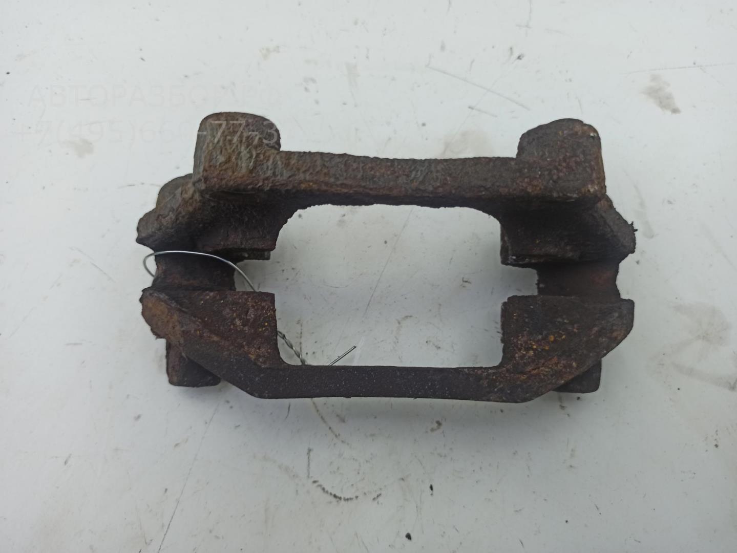 Скоба суппорта заднего