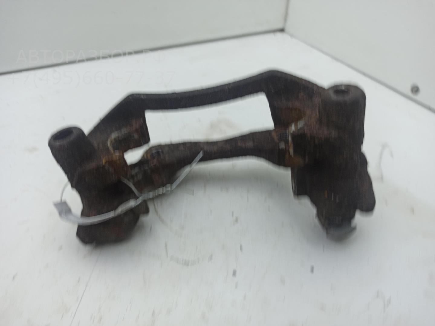 Скоба суппорта заднего