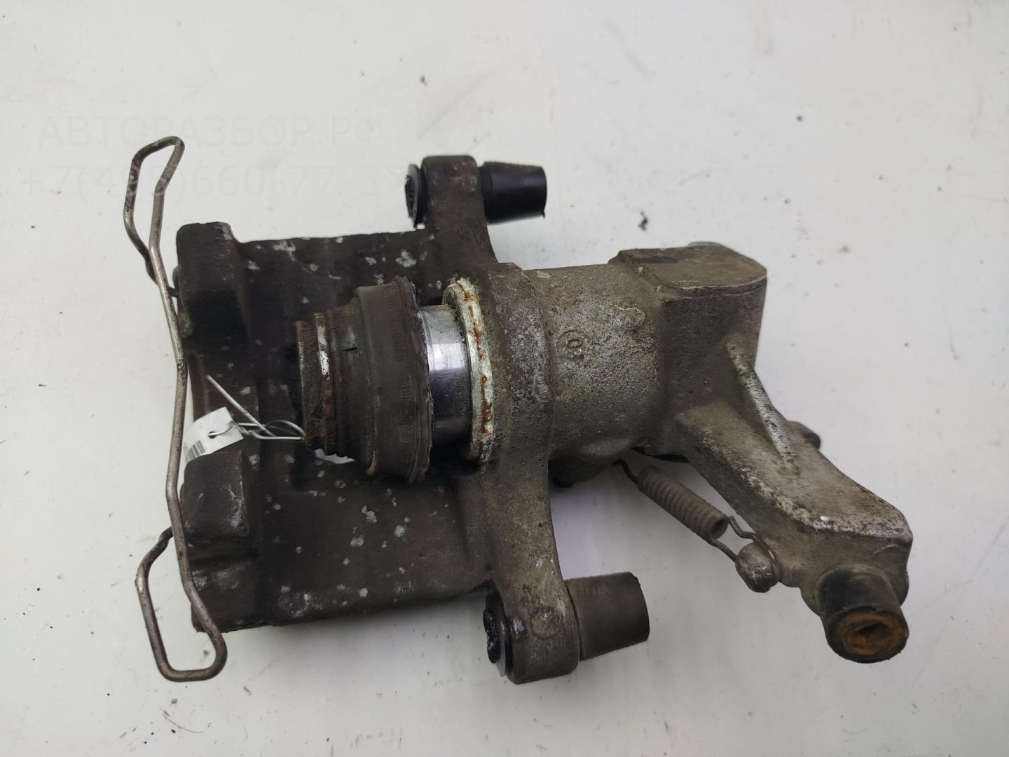 Суппорт задний левый