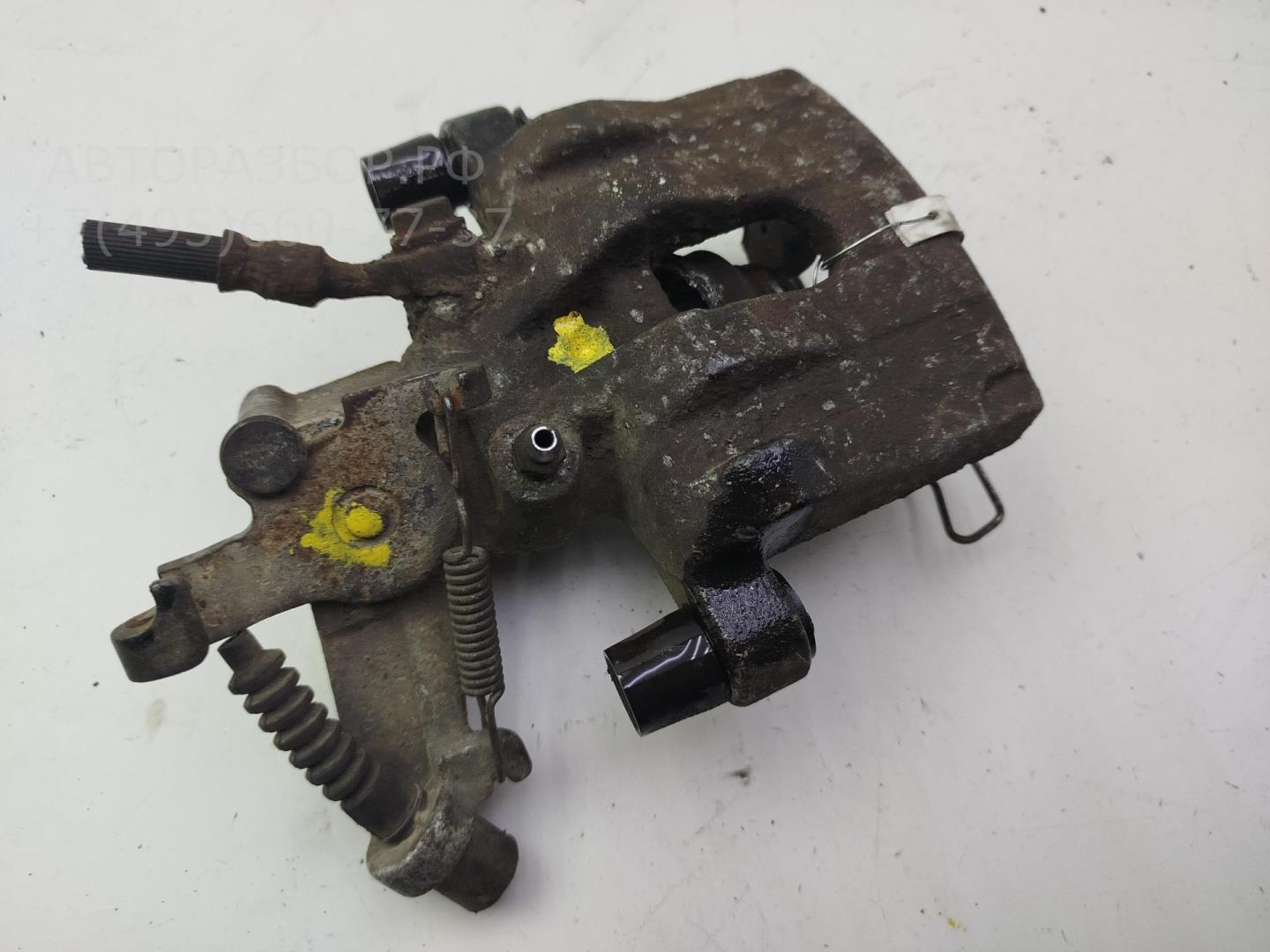 Суппорт задний левый