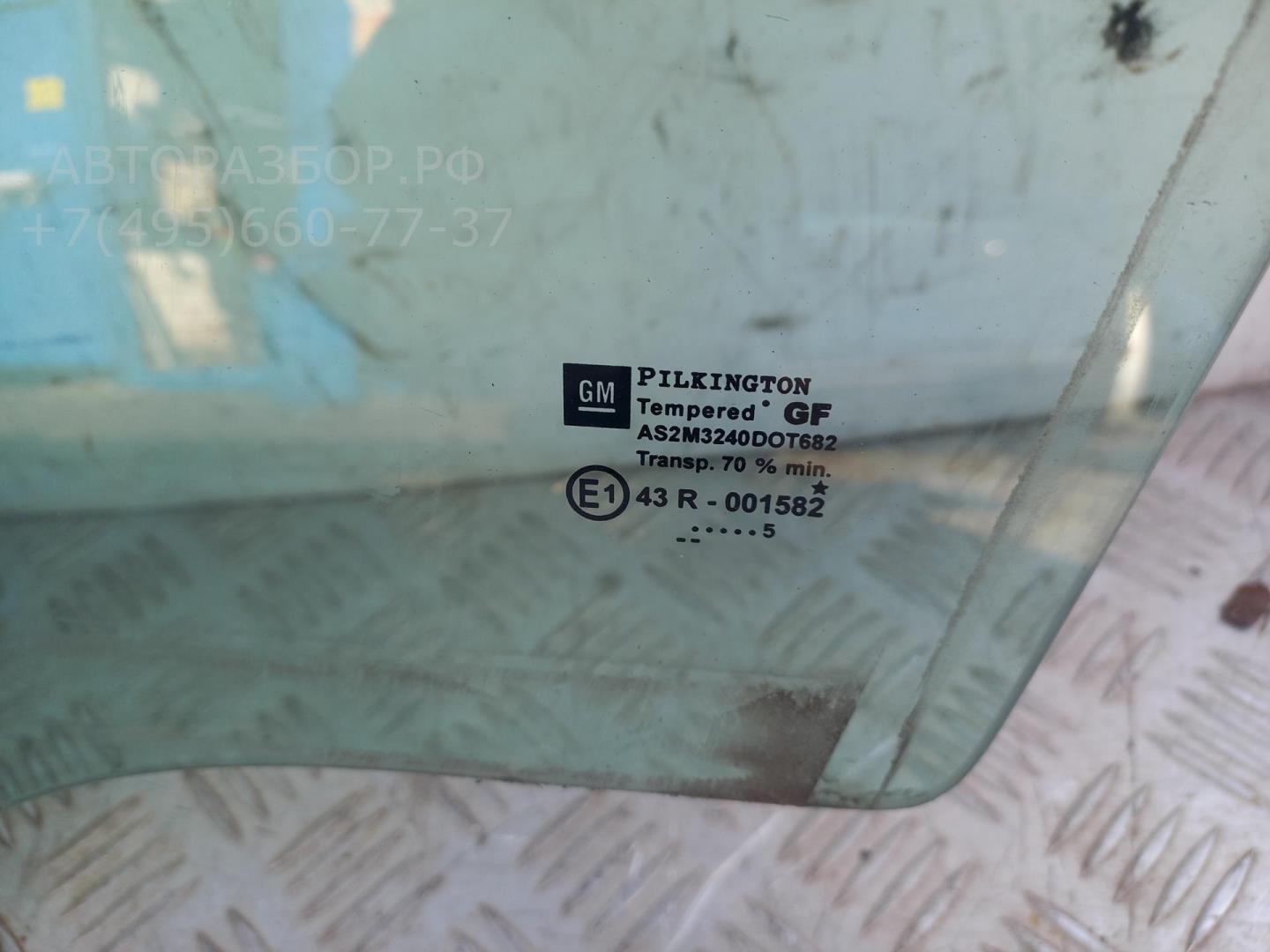 Стекло двери передней левой