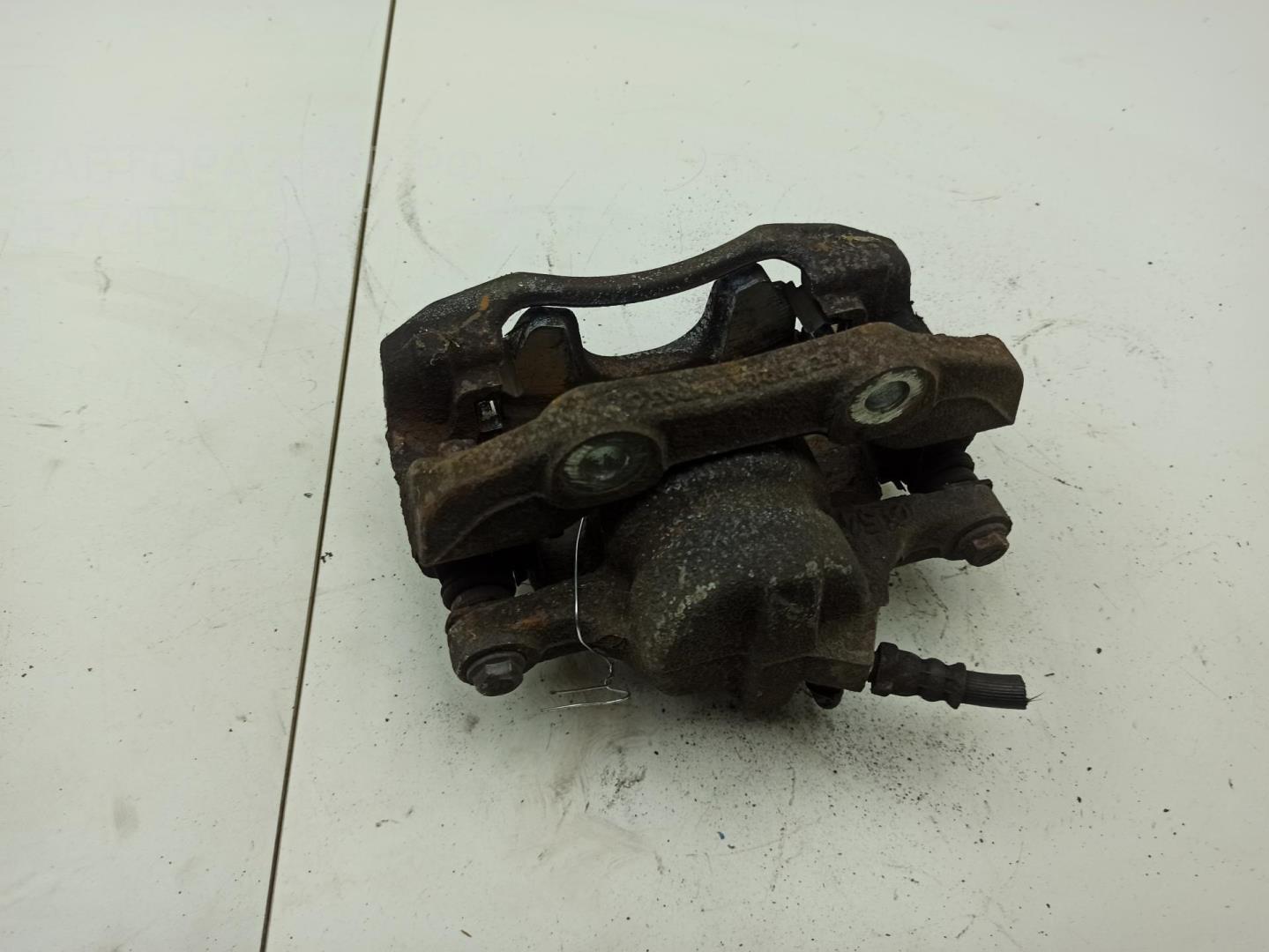 Суппорт передний левый