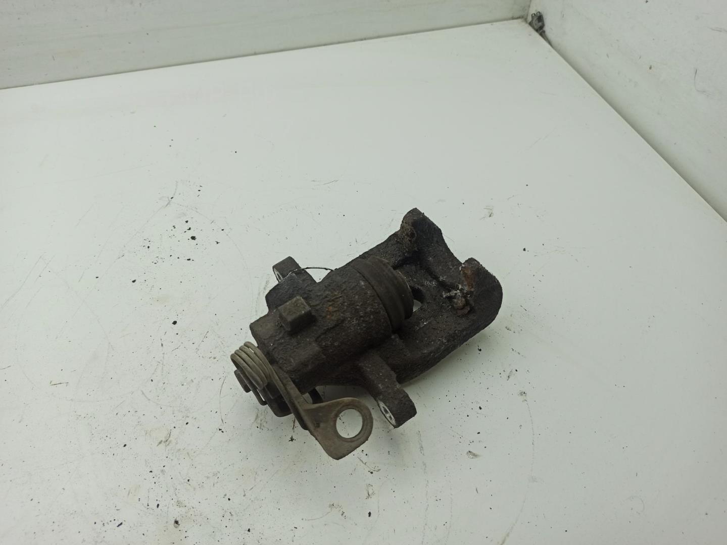 Суппорт задний левый