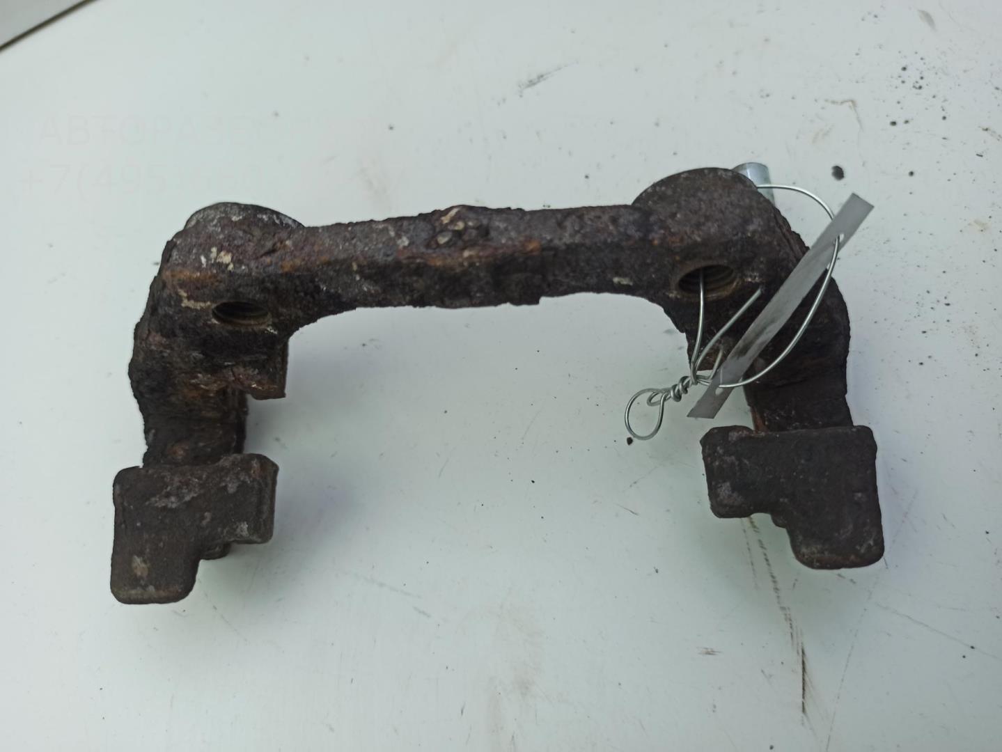 Скоба суппорта заднего