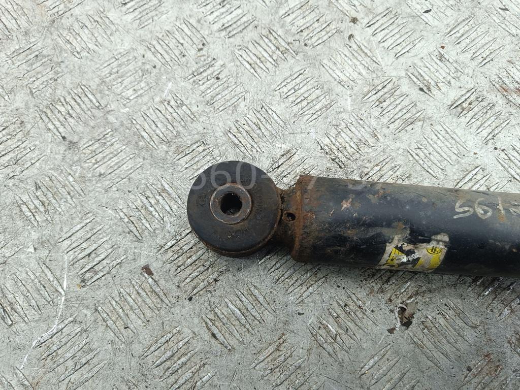 Амортизатор задний левый