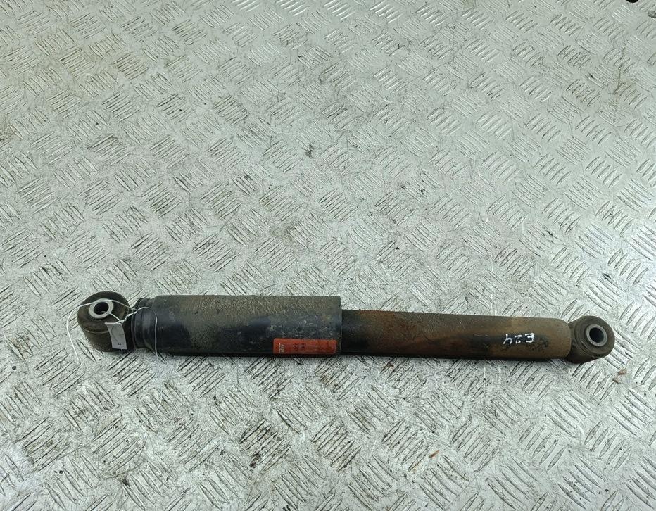 Амортизатор задний левый