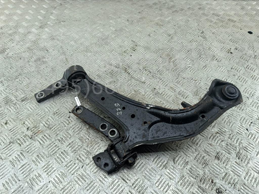 Рычаг передний левый