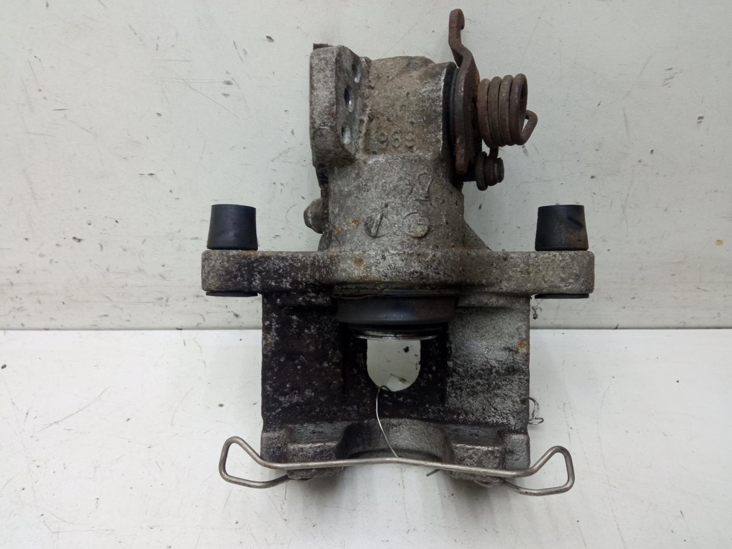 Суппорт задний левый