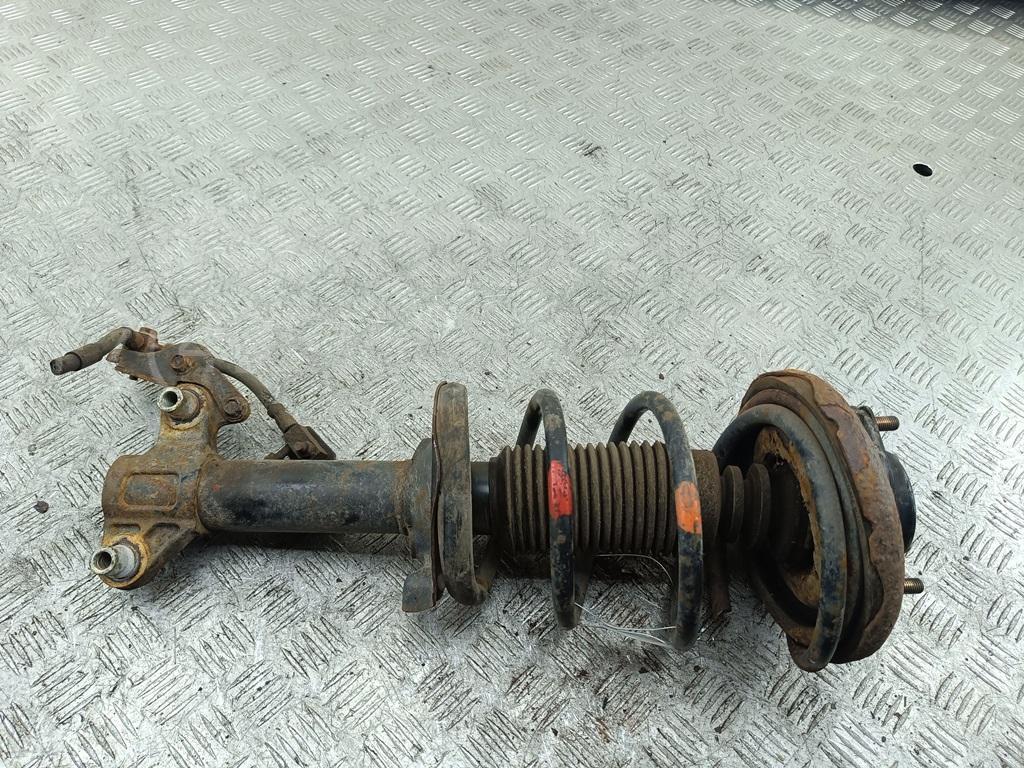 Амортизатор передний левый