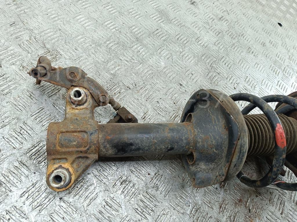 Амортизатор передний левый