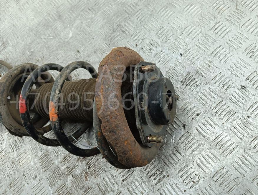 Амортизатор передний левый