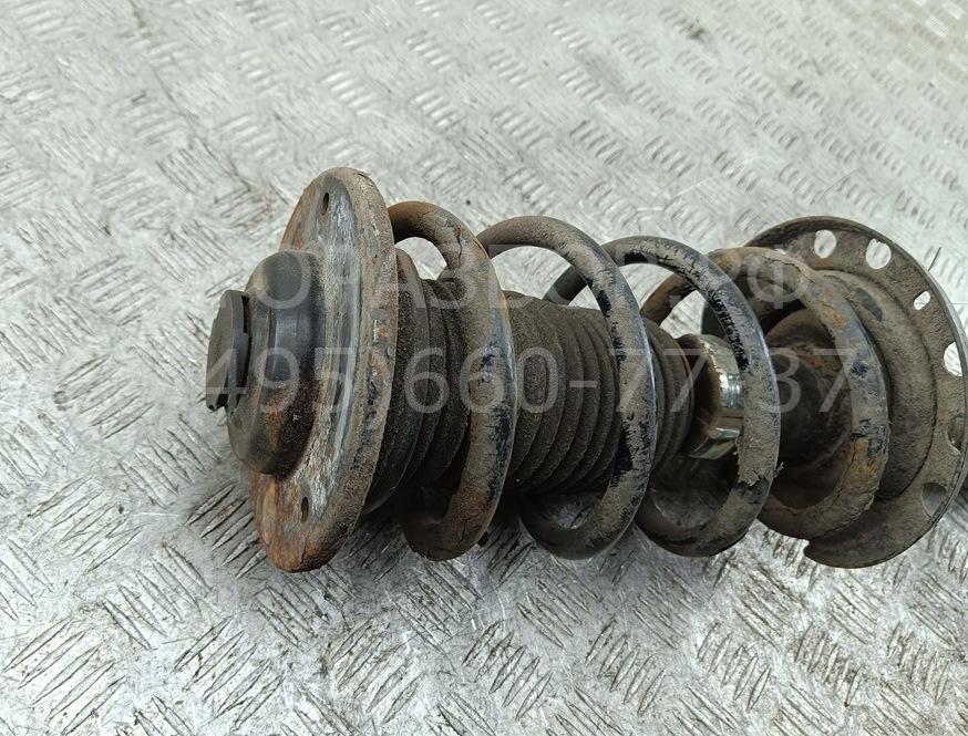 Амортизатор передний левый