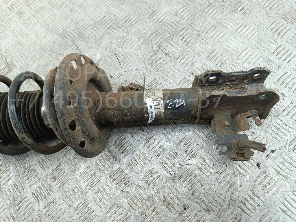 Амортизатор передний левый