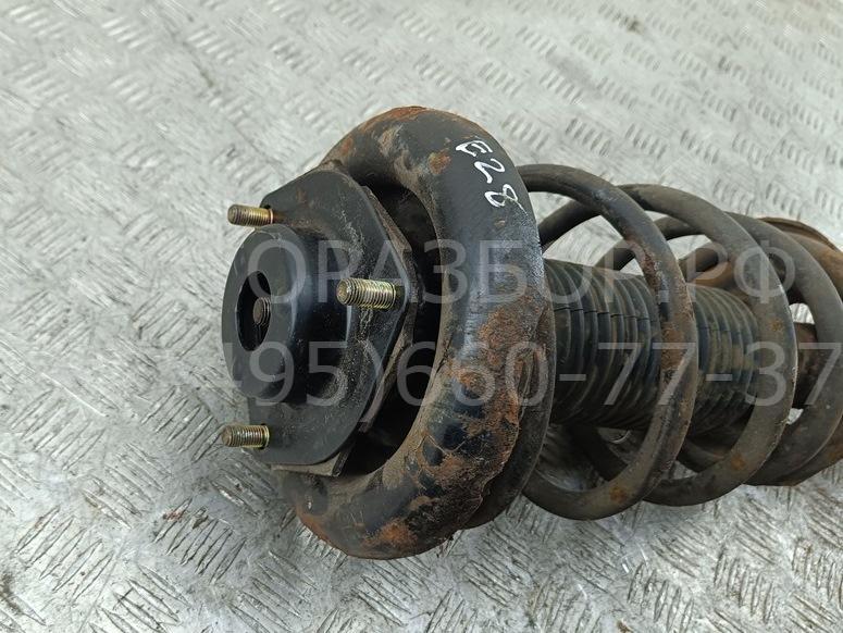 Амортизатор передний левый