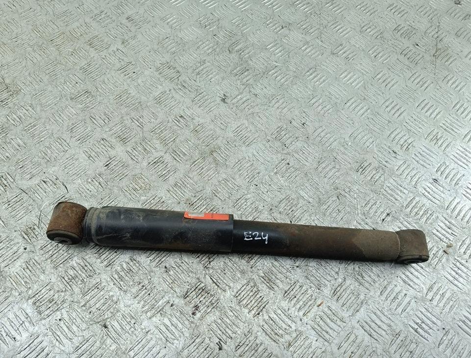 Амортизатор задний левый