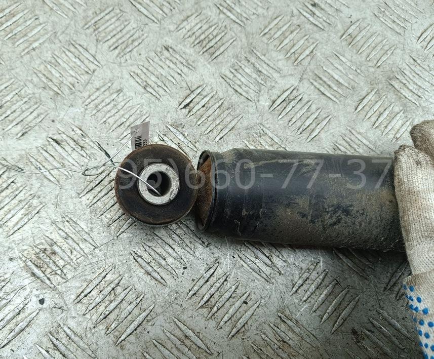 Амортизатор задний левый