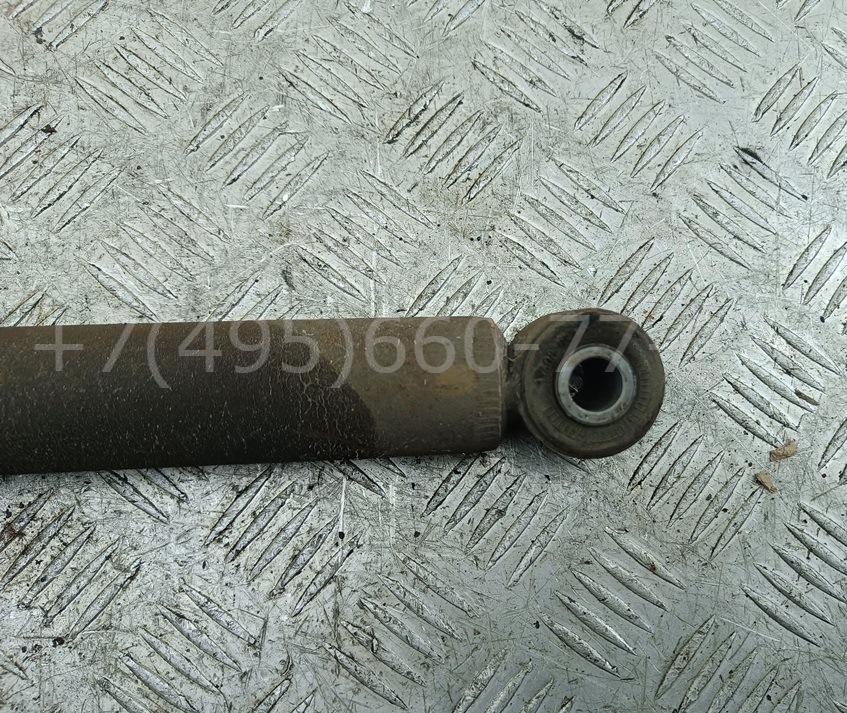 Амортизатор задний левый