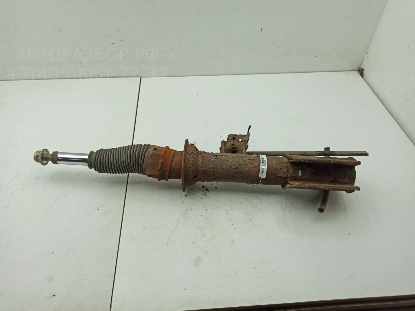 Амортизатор передний левый