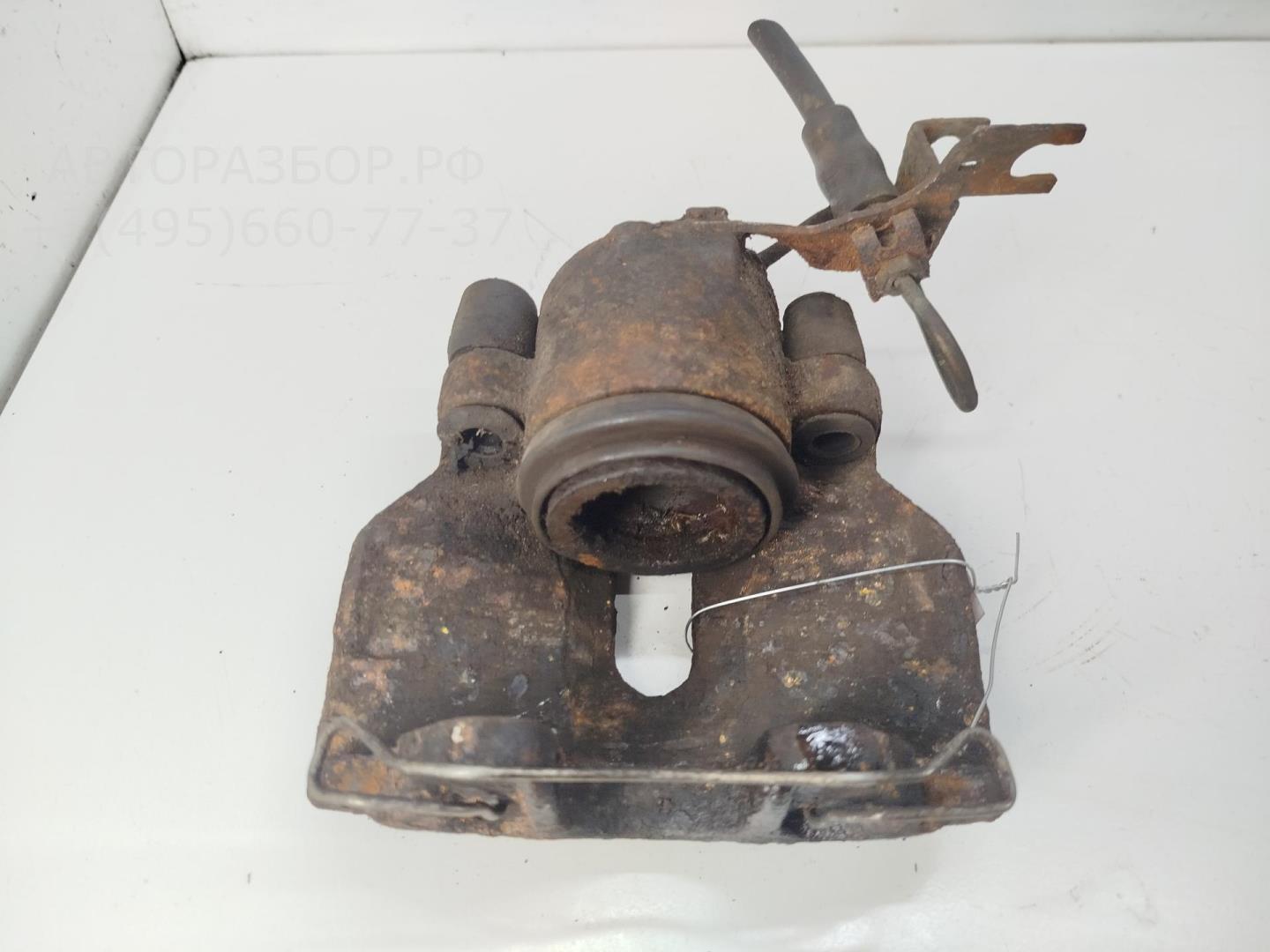 Суппорт передний левый