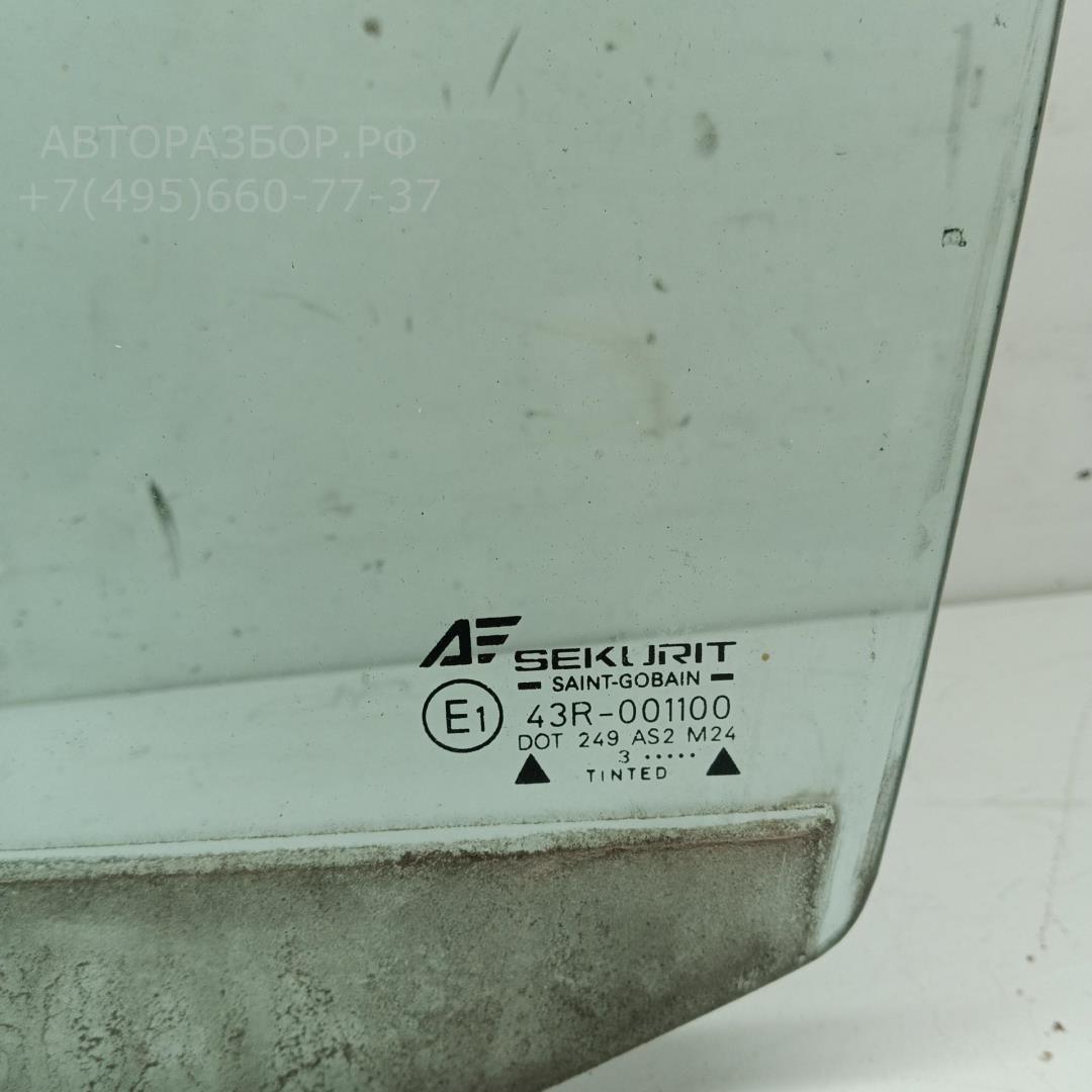 Стекло двери передней левой