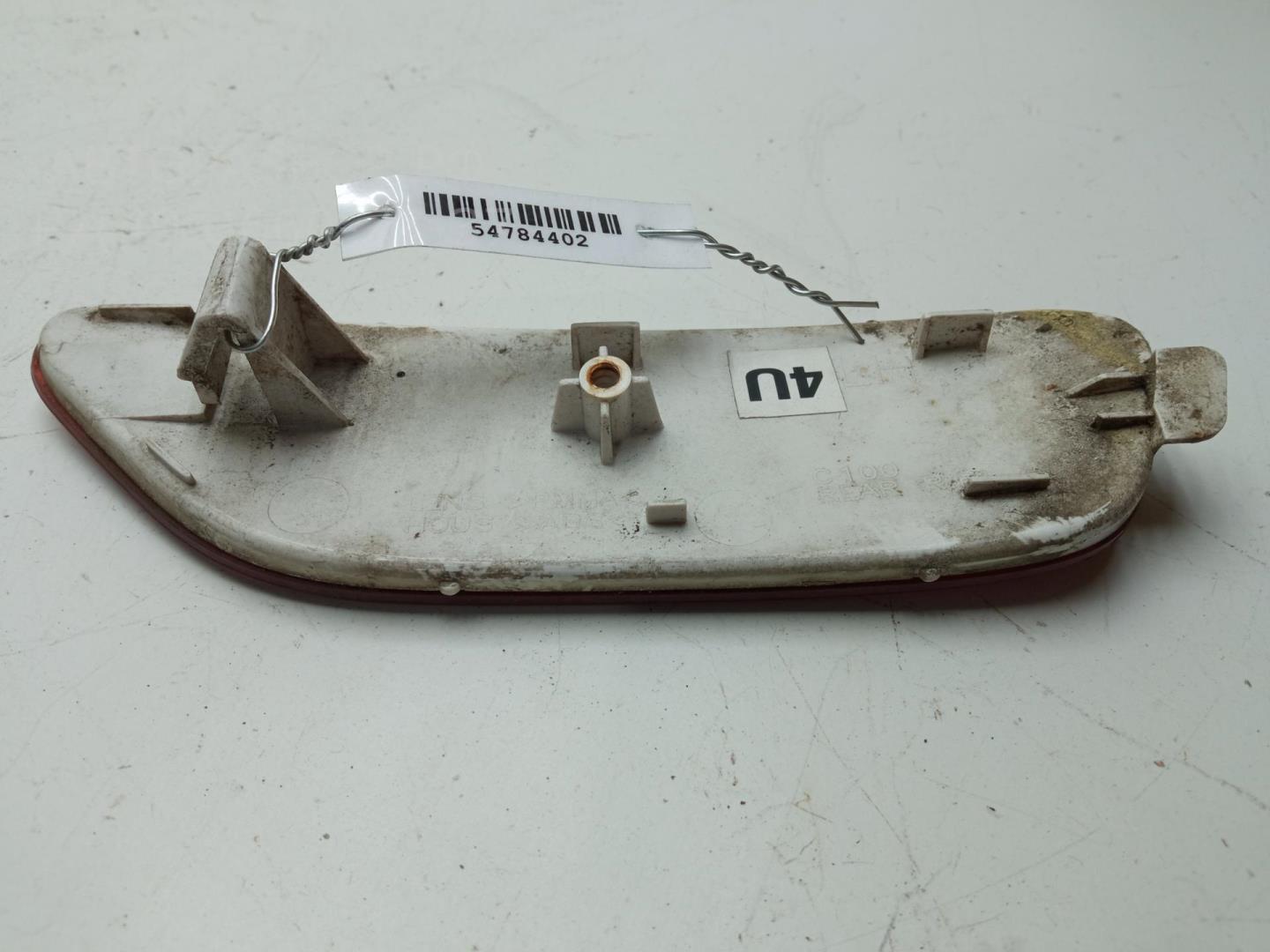 Отражатель в бампер задний левый