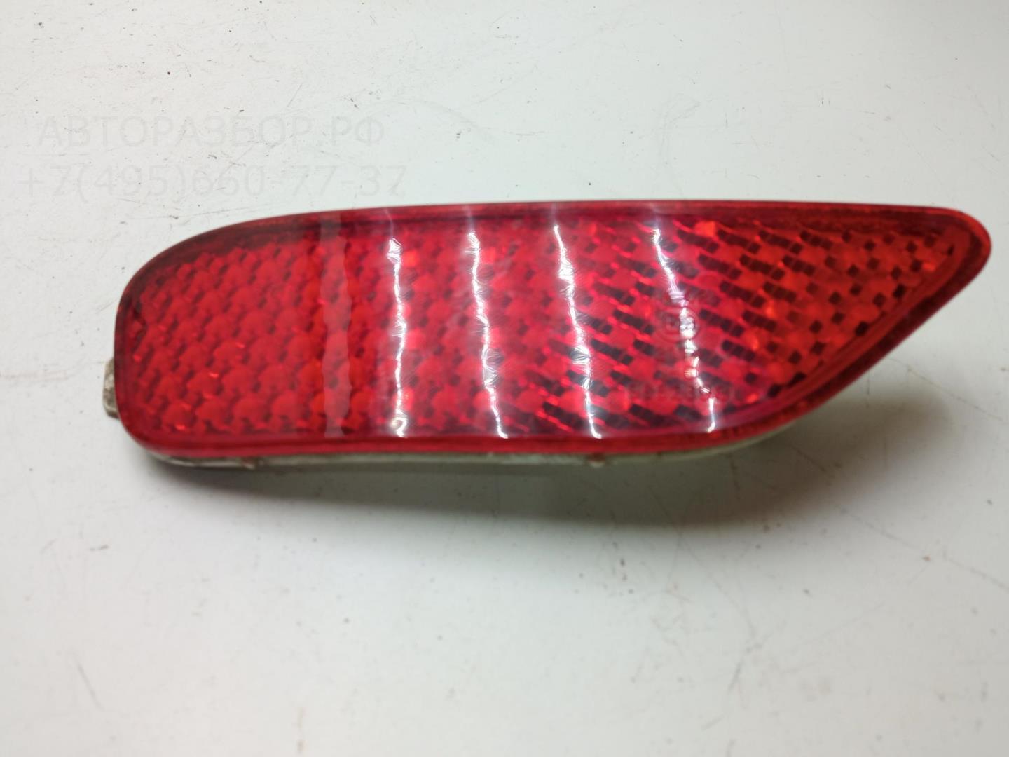 Отражатель в бампер задний левый