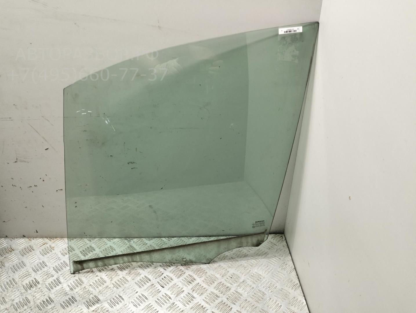 Стекло двери передней левой