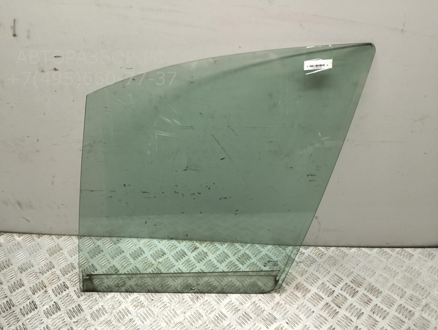 Стекло двери передней левой