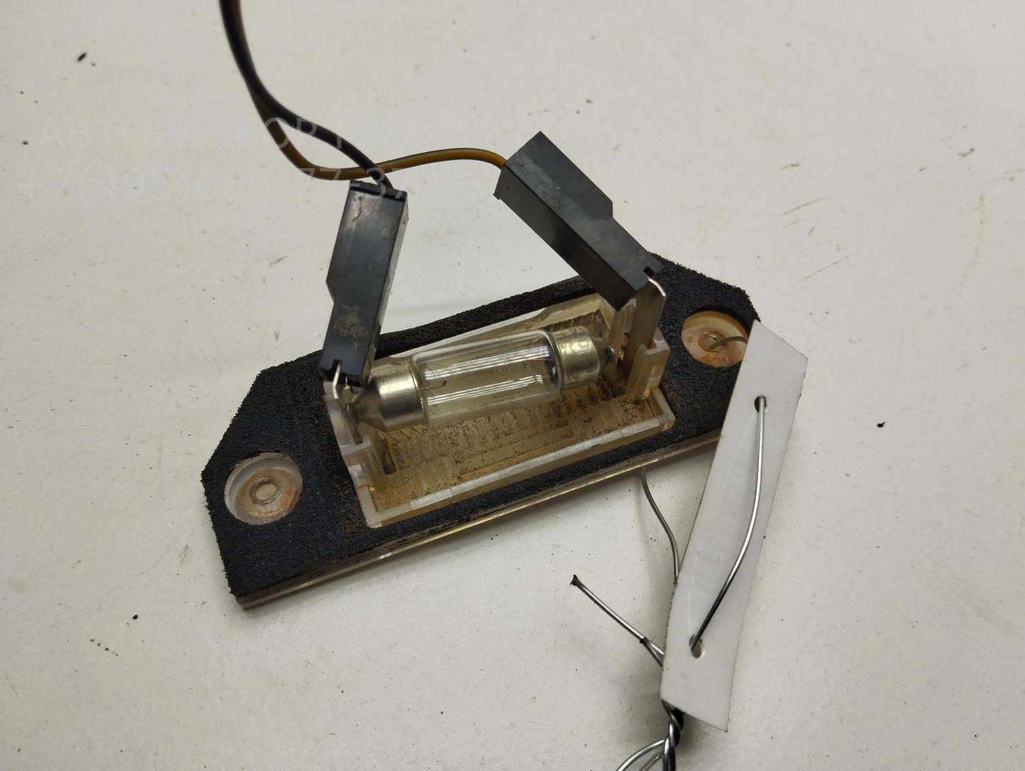 Фонарь подсветки номера