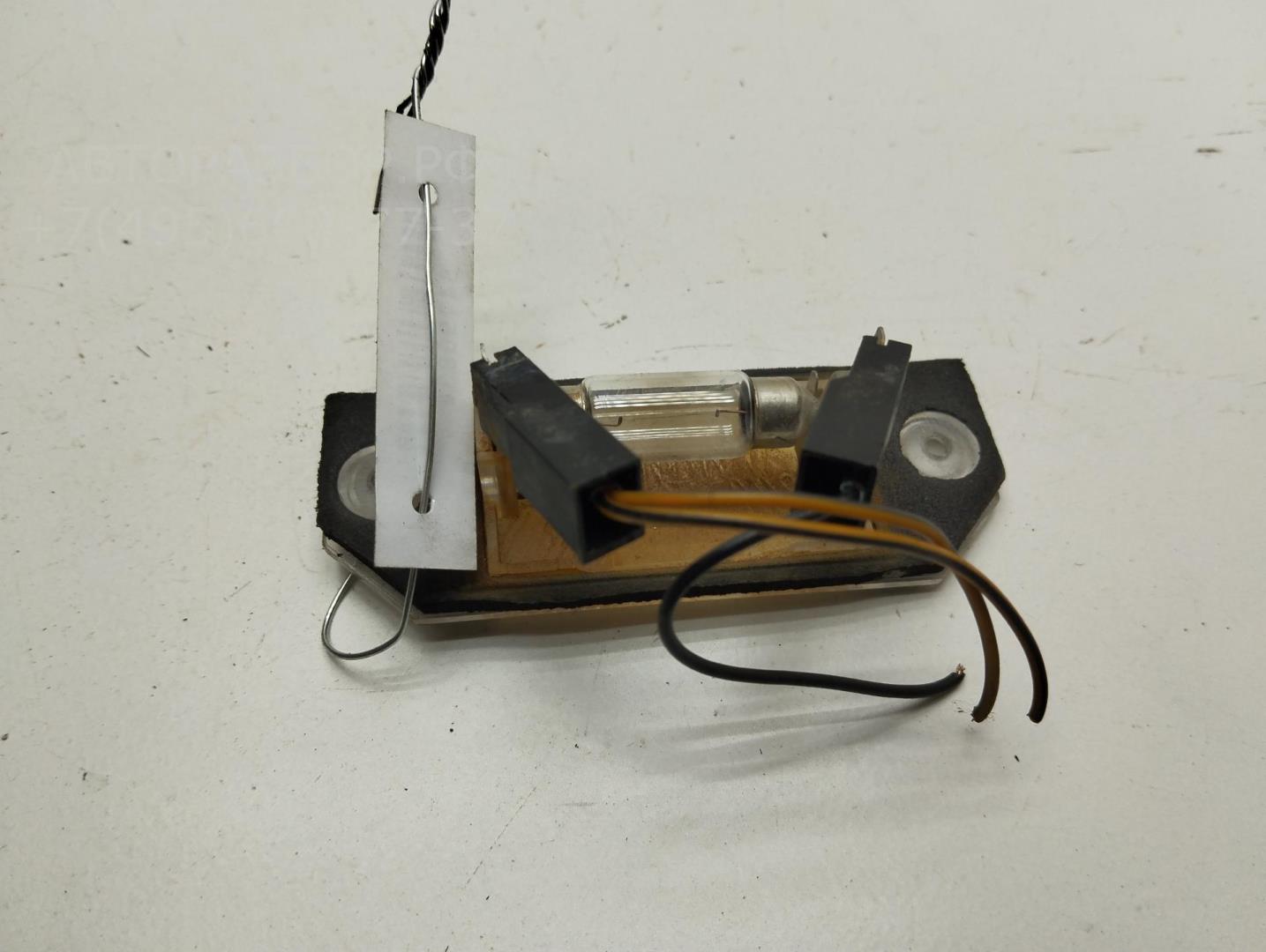 Фонарь подсветки номера